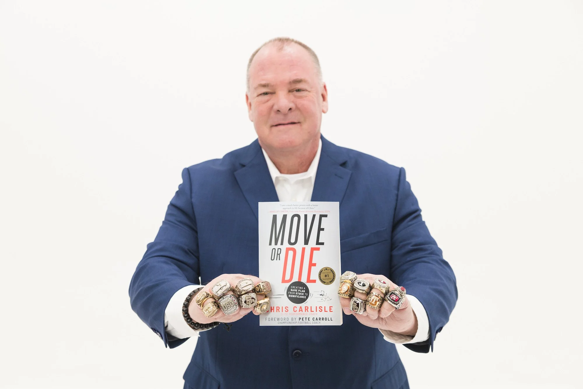 Chris Carlisle, Super Bowl-winning coach and author of Move or Die.